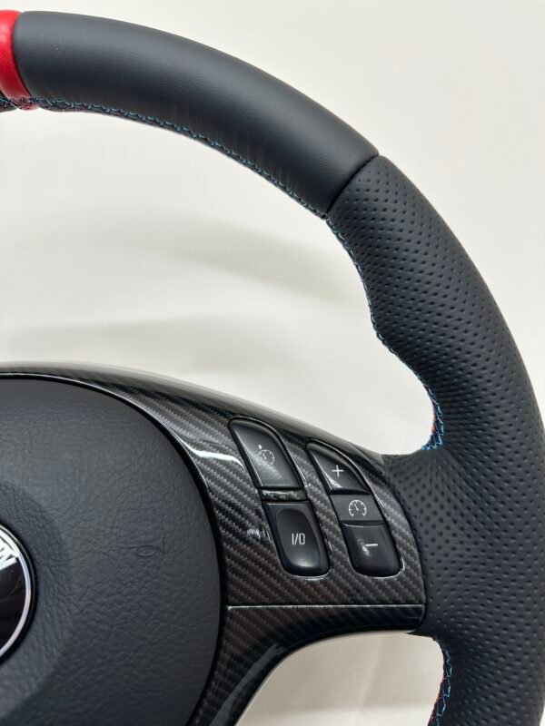 Bmw E46 E39 Steering wheel carbon trim showcasing top part of steering wheel, buttons