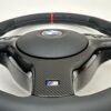 Bmw E46 E39 Steering wheel with carbon trim and red stripe shiwcasing carbon quality closeup zoom