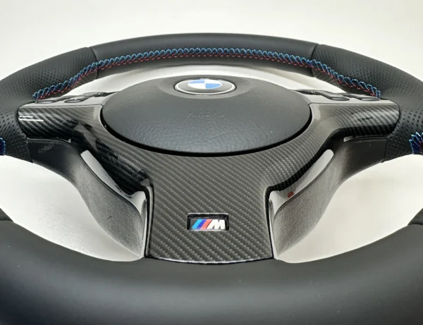 bmw-e39-e46-e53-m-sport-steering-wheel-carbon-09 bmw e39 e46 e53 m sport steering wheel perforated leather carbon plastic trim close up