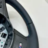 bmw-e60-e63-e64-m-sport-steering-wheel-carbon-04 bmw e60 e63 e64 m sport steering wheel m tricolor stitching carbon trim bottom right stitches