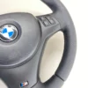 bmw e82 e88 e92 m sport steering wheel closeup bottom right of the steering wheel
