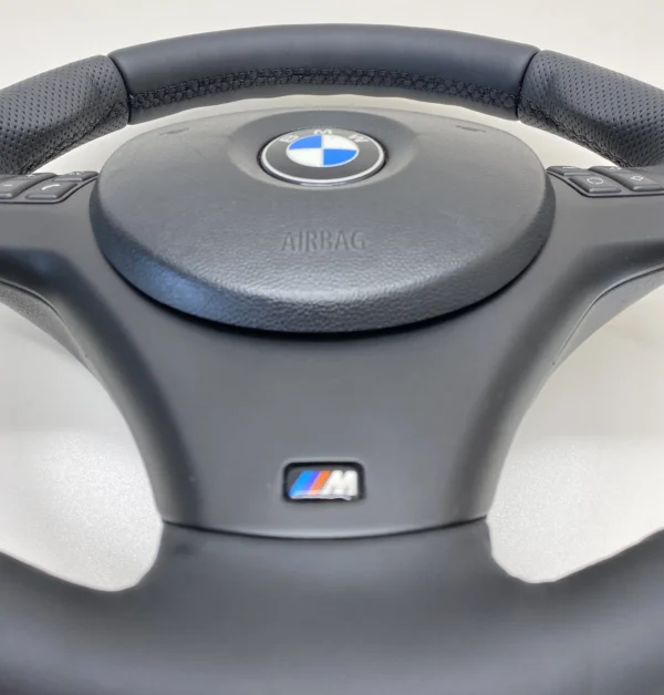 bmw e82 e88 e92 m sport steering wheel showcasing bottom trim quality of the steering wheel