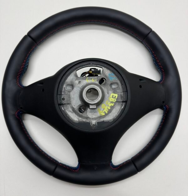 bmw-e83-x3-m-sport-steering-wheel-08 bmw e83 x3 m sport steering wheel smooth leather m stitching no airbag back side view