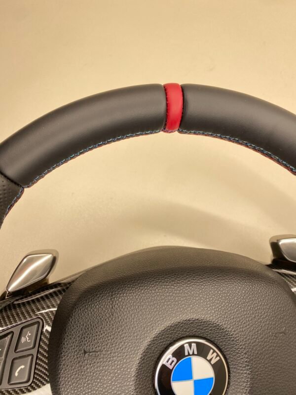 bmw e88 e90 e92 m sport steering wheel with pre lci paddles carbon trim red stripe m stitching top view