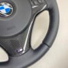 bmw e88 e90 e92 m sport steering wheel with pre lci paddles carbon trim red stripe m stitching bottom right view