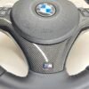bmw e88 e90 e92 m sport steering wheel with pre lci paddles carbon trim red stripe m stitching bottom middle view