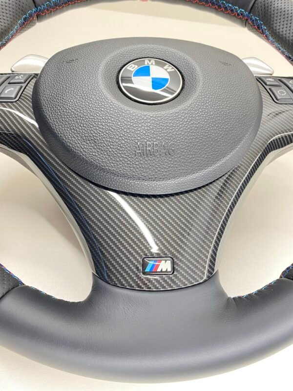bmw e88 e90 e92 m sport steering wheel with pre lci paddles carbon trim red stripe m stitching bottom middle view