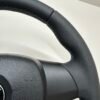 buttonless bmw e90 e92 e87 e82 m sport steering wheel top right closeup