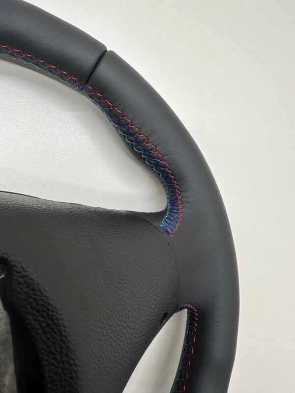 buttonless bmw e90 e92 e87 e82 m sport steering wheel back right of the steering wheel m stitches