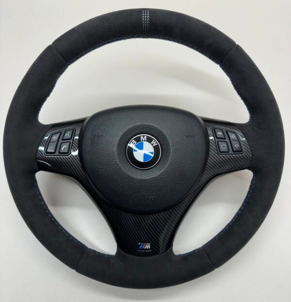 center view of bmw e90 e92 m3 alcantara cs edition steering wheel with carbon trim buttons and airbag