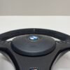 bmw e90 e92 m3 alcantara cs edition steering wheel with carbon trim buttons and airbag bottom center view with airbag