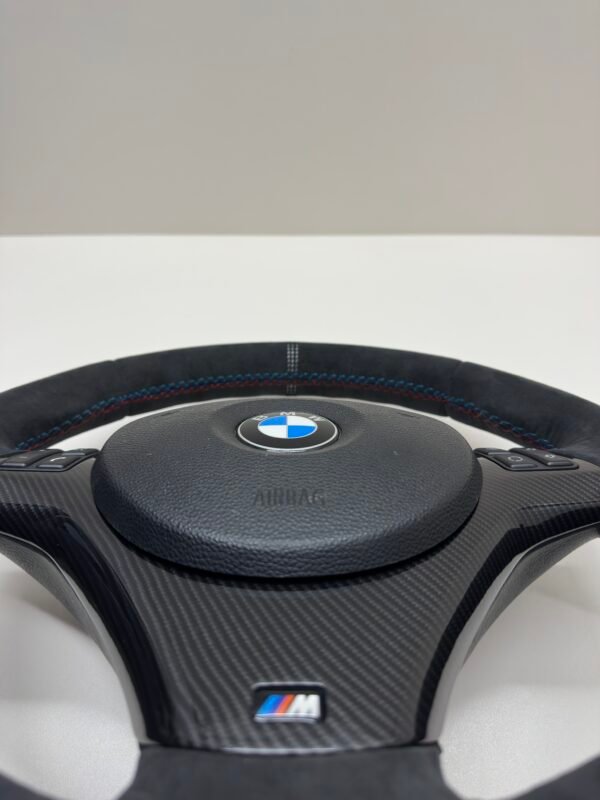 bmw e90 e92 m3 alcantara cs edition steering wheel with carbon trim buttons and airbag bottom center view with airbag