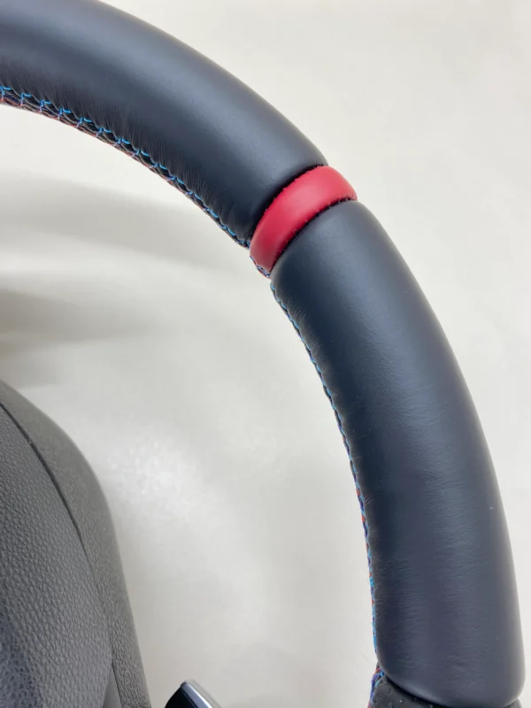 bmw e88 e90 e92 m sport steering wheel lci shifters red stripe close up view